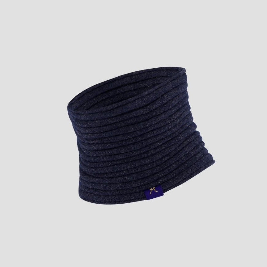 Navy blue knitted neck warmer on a light gray background