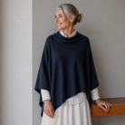 Women in blue poncho